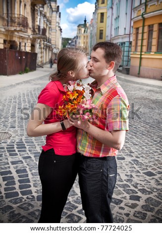 Love in retro block.Two person kissing