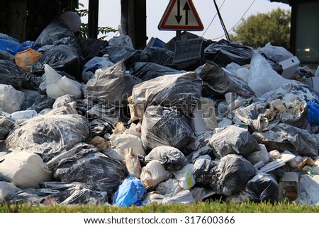 JOUNIEH, LEBANON - AUGUST 1: Piling trash in the streets of Lebanese cities shown on 1 August 2015 in the city of Jounieh. This garbage crisis is behind current demonstrations against the government.