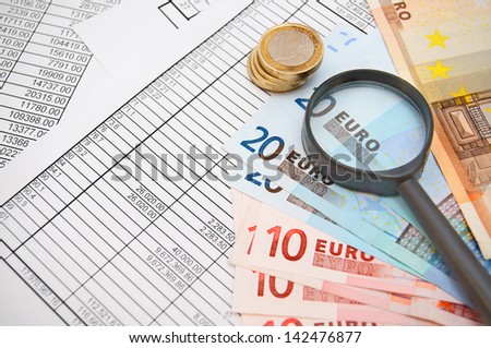 magnifiers, money on documents.
