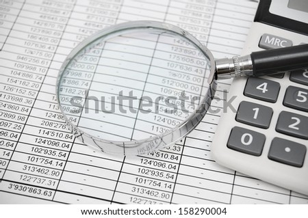 The calculator and magnifier on documents.