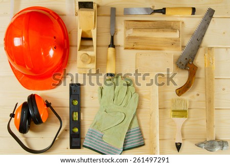 Working tools. Many working tools on a wooden background.