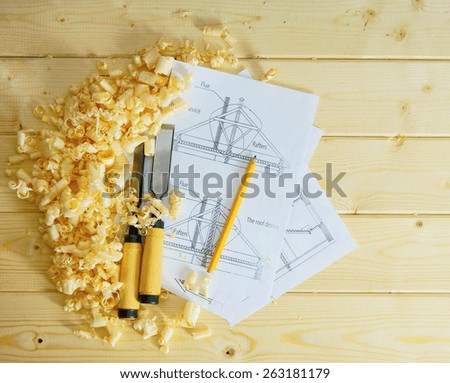 Planning of repair of the house. Woodworking. Drawings for building and working tools on wooden background.