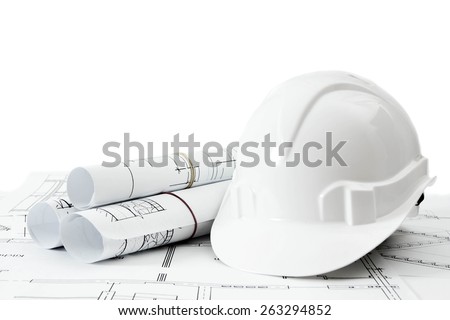 Construction house. Repair work. Drawings for building and helmet on white a background.