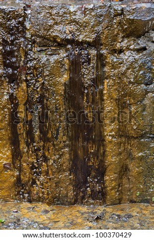 Natural oxide texture produced by water and algae