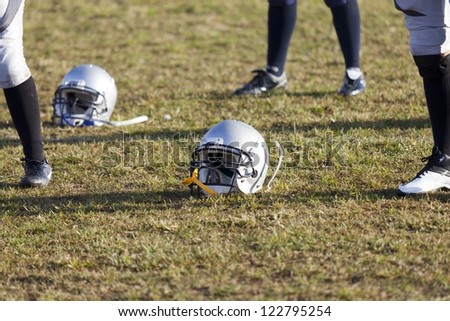Football helmet on the floor of the stadium