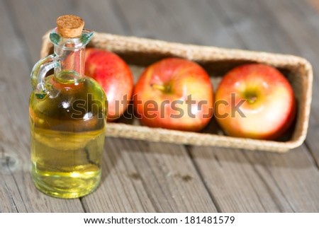 Homemade Vinegar galas apples on a table in a farmhouse