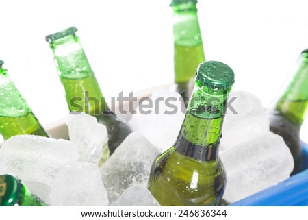 Fresh beer in a cooler with ice