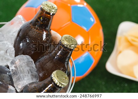 Fresh beer in a cooler with ice