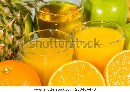 Fresh pineapple juice, orange and fresh apples