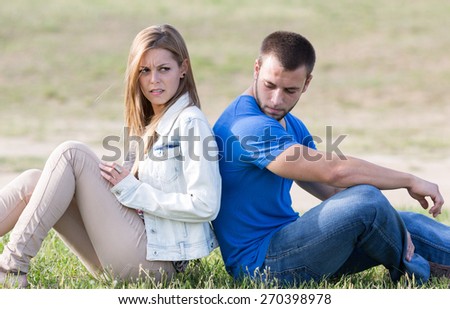 Couple sitting back with problems boyfriends