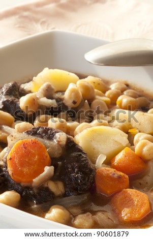 Chickpea stew with black pudding and potato
