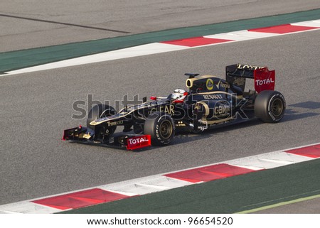 BARCELONA - MARCH 3: Kimi Raikkonen of Lotus  F1 team racing during Formula One Teams Test Days at Catalunya circuit on March 3, 2012 in Barcelona, Spain.