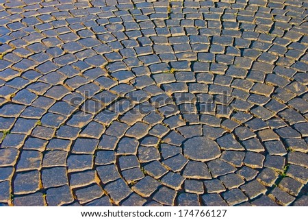 Detail of a cobbled road, ring of cobble