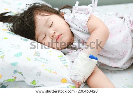 Little girl sick on the sick bed