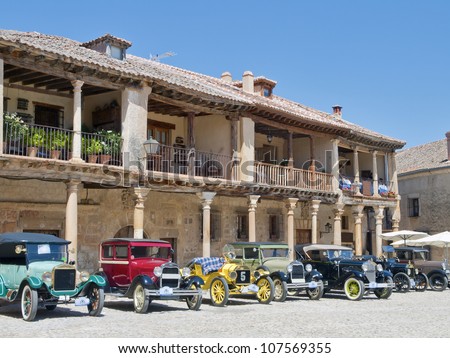 vintage cars in the medieval village of pedraza, segovia, Spain