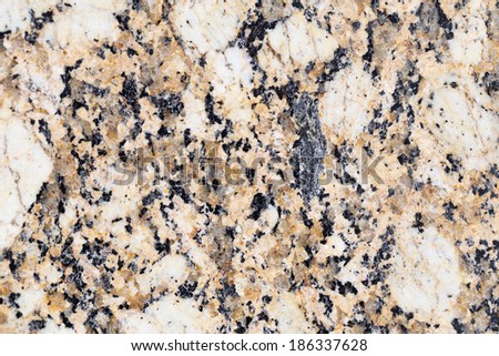 A polished granite slab background