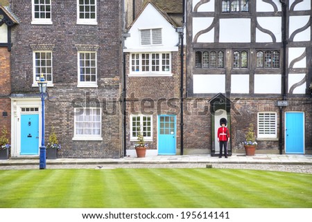 LONDON-MAY 10:. Queen\'s Guard - Tower of London on May 10, 2014 The Queen\'s Guard is the contingents of infantry and cavalry soldiers charged with guarding the official royal residences.