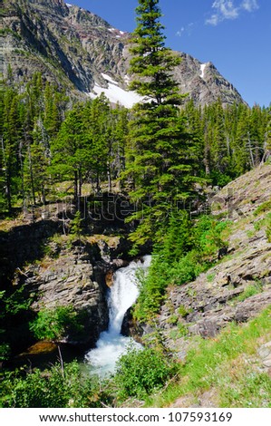 A small waterfall along the Lake Okatomi Trail in Glacier National Park