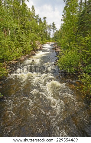 Dramatic Rapids in the Rushing River in Rushing River Provincial Park in Ontario