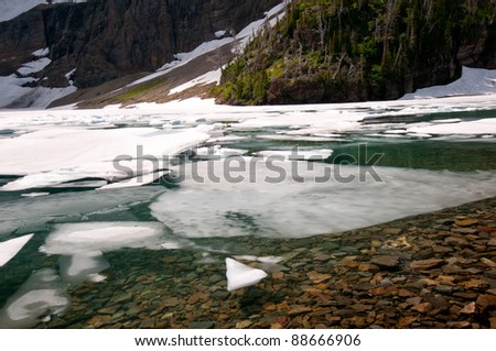 Ice on Iceberg lake in Glacier National Park