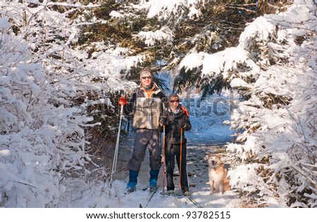 Man and woman skiing in Sleepy Hollow State Park In Michigan
