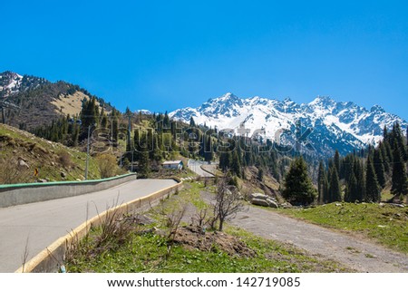 Nature of  mountains,  green trees and blue sky, road on Medeo in Almaty, Kazakhstan,Asia at summer