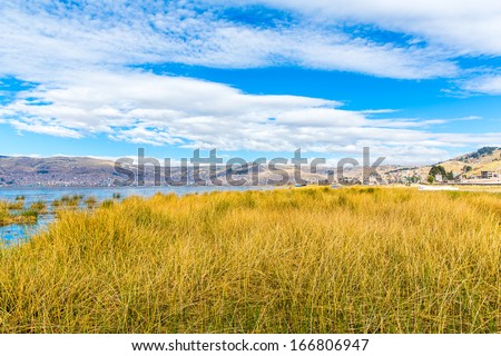 Lake Titicaca,South America, located on border of Peru and Bolivia  It sits 3,812 m above sea level, making it one of the highest commercially navigable lakes in the world
