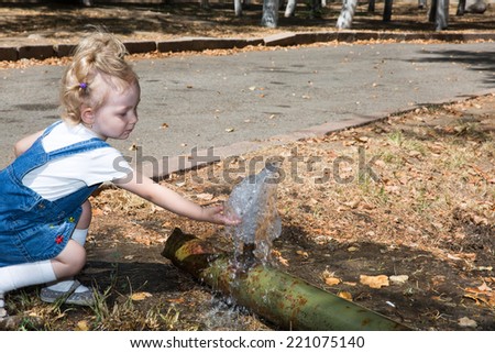 Adorable little child girl in park. Use it for baby, parenting or love concept
