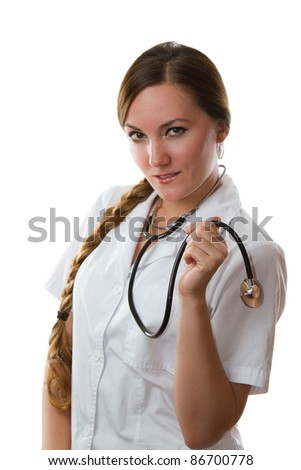 Female mature female medical doctor in white uniform smiling with her hands folded with stethoscope, isolated white background