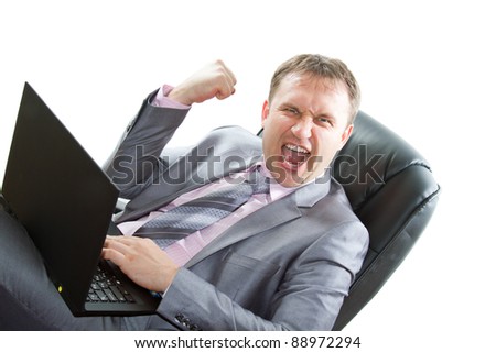 successful business man in a stylish suit works laptop cry on an isolated white background.
