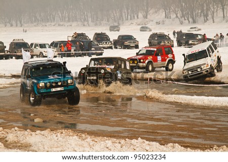 Almaty, Kazakhstan - February 11, 2012. Off-road racing jeeps, festival, devoted to 20 Th anniversary of independence of Kazakhstan, in honor of first president of Federation Avtomotosport Kazakhstan.