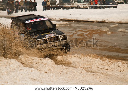 Almaty, Kazakhstan - February 11, 2012. Off-road racing jeeps, festival, devoted to 20 Th anniversary of independence of Kazakhstan, in honor of first president of Federation Avtomotosport Kazakhstan.