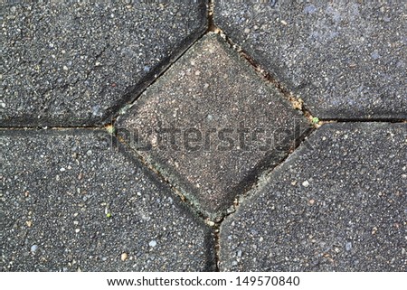 Decorative stone floor bricks in mosaic pattern