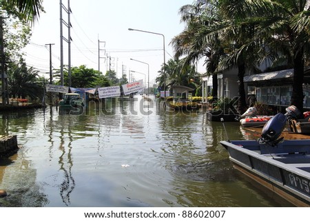 PRATHUMTHANI, THAILAND - NOV 11 : flooded street after flood disaster in Nava nakorn, Prathumthani, Thailand on November 11, 2011.