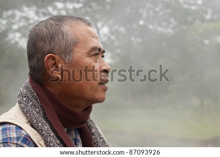 Profile of an Old Man Staring