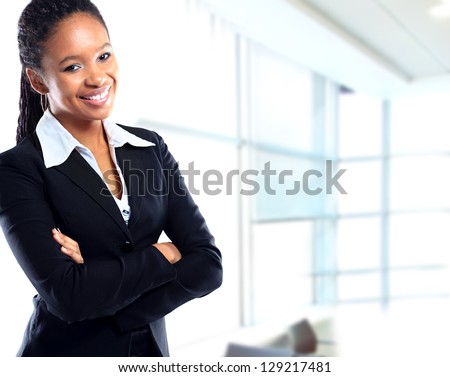 Smiling Young African Businesswoman With Briefcase