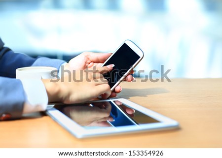 Businessman Using Digital Tablet Computer With Modern Mobile Phone. New Technologies For Success Workflow Concept.