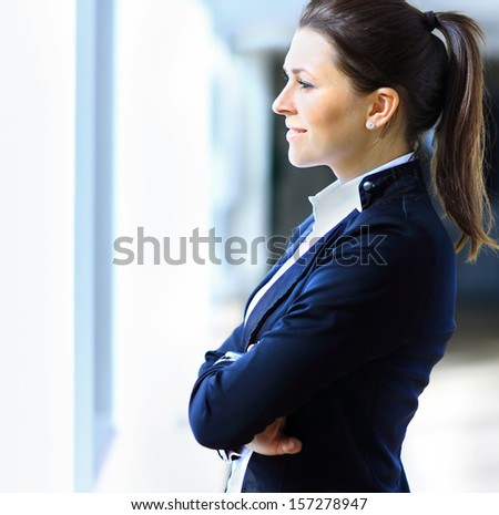 Successful Business Woman Looking Confident And Smiling