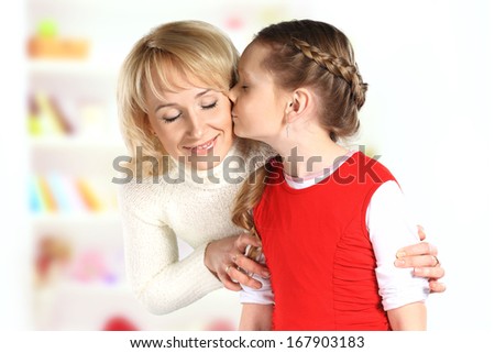 Daughter kiss her mother