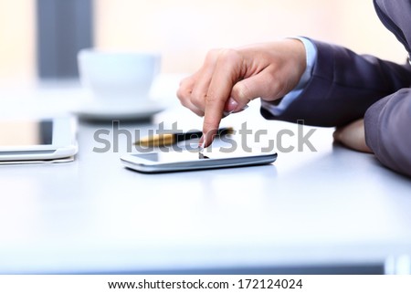 Modern Workplace With Digital Tablet Computer And Mobile Phone, Cup Of Tea. Close Up.