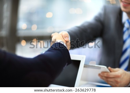 Closeup shot of a two businesspeople shaking hands