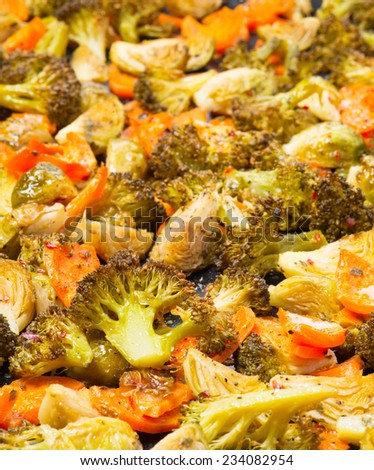 Vegetarian food: baked vegetables ( brussels sprouts, carrots, broccoli)