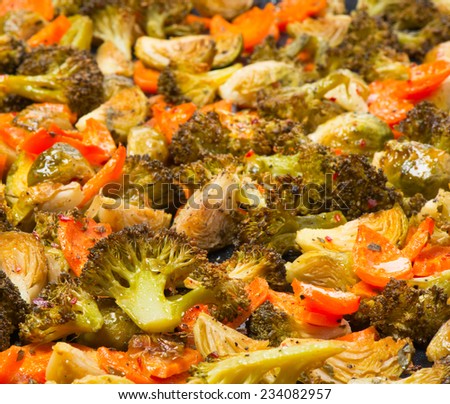 Baked vegetables: broccoli,  brussels sprouts,  carrots and  spice