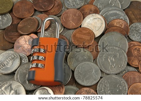 Dial combo lock on coins (in concept of financial security)