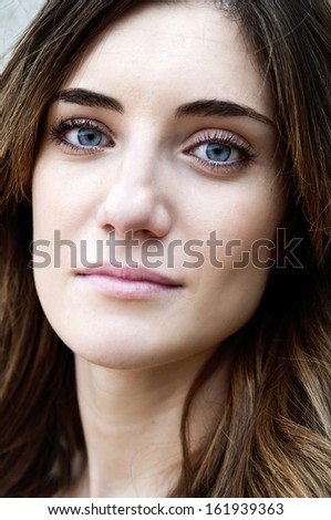 Attractive Blue Eyed Woman Close Up Serious Expression
