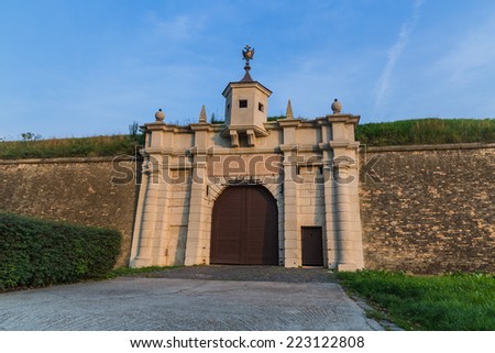 Leopold gate is the main entrance to the fort called New Fortress of the fortification system of the bastion type in Slovak town Komarno at sunset scenery.
