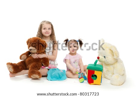 stock photo Two little girls with toys