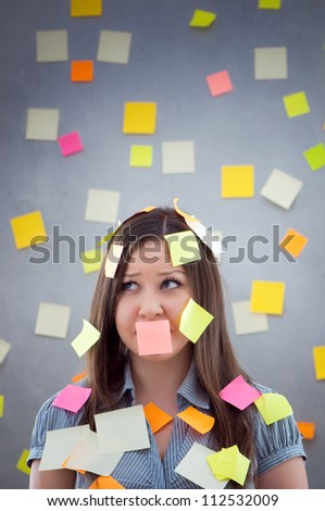 secretary overwhelmed with notes