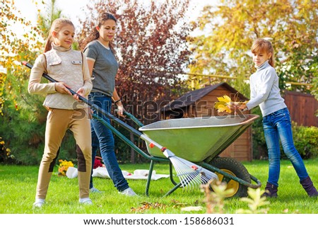 family gardening at autumn