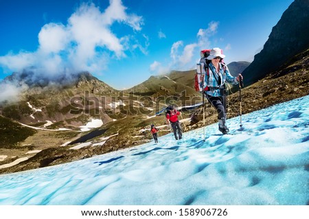 group hiking in mountains